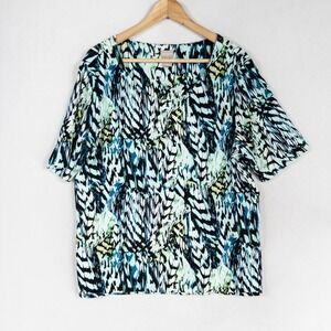 Chicos Top Sz 3 US XL Blue Geometric Stretch Knit Front Lined Short Sleeve